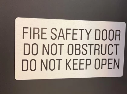BRUSHED METAL SIGNS