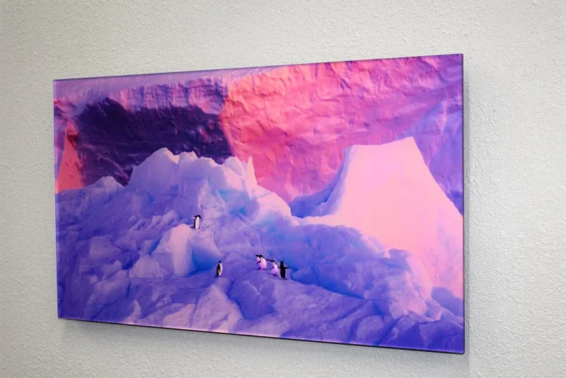 Purple landscape artwork on a wall-mounted panel