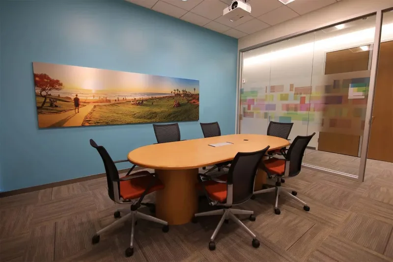 Wide landscape wall print in a meeting room