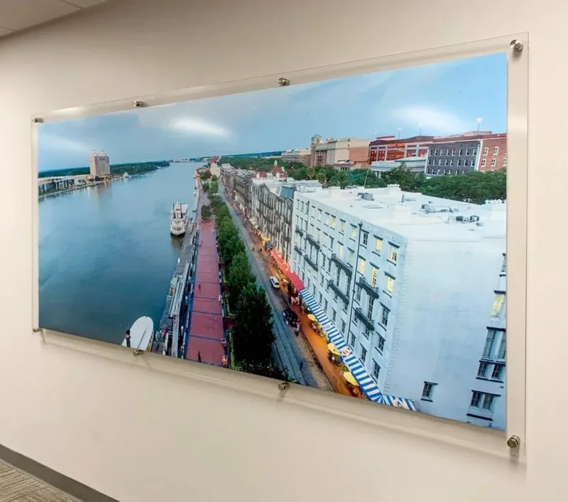 Panoramic city photograph mounted on a wall