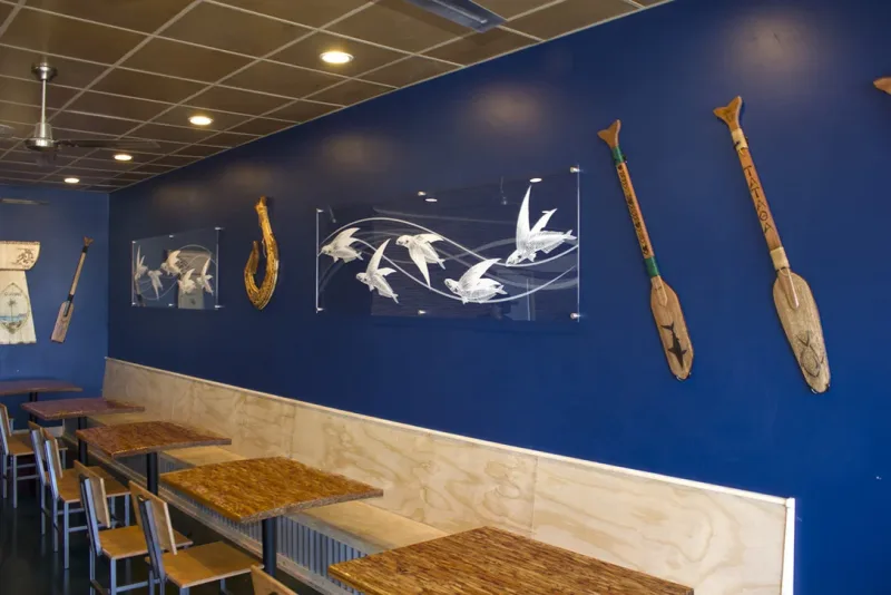 Decorative wall graphics and lettering in a hospitality interior