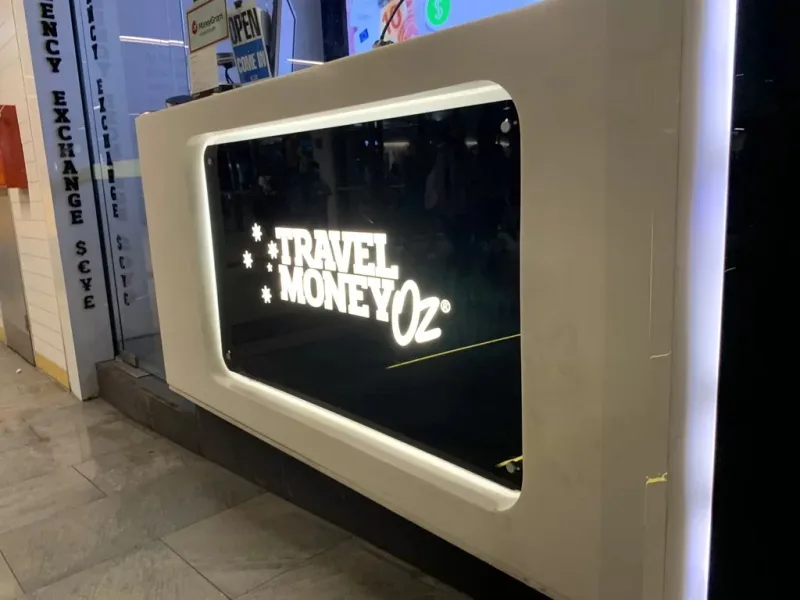 Travel Money Oz illuminated counter sign