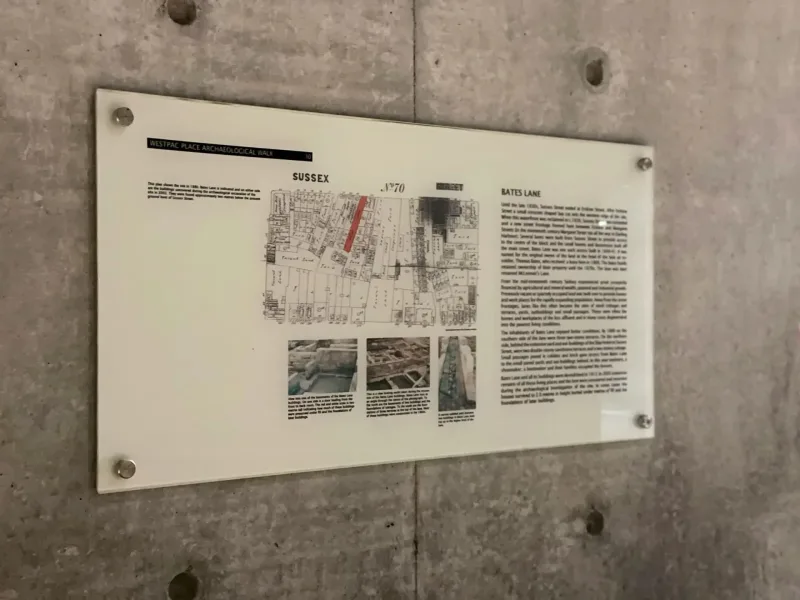 Clear information panel mounted on concrete with stand-offs