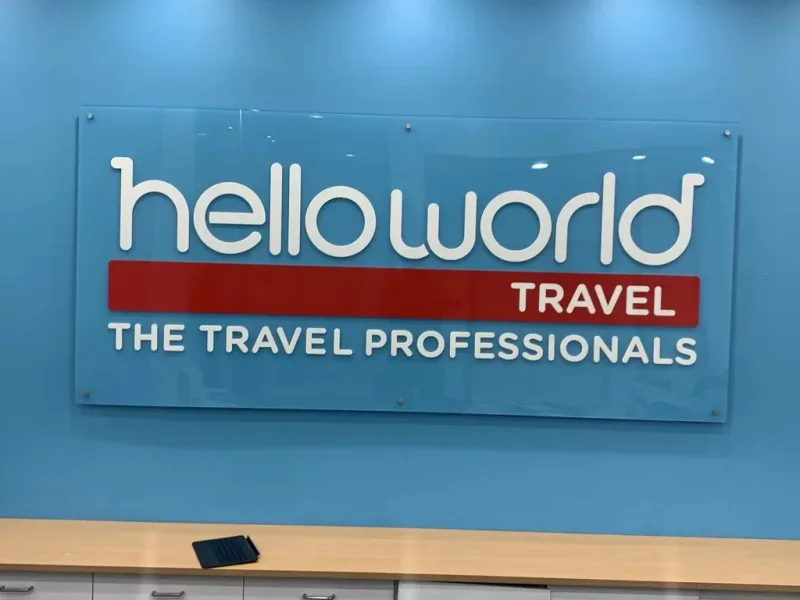 Helloworld Travel reception panel with stand-off fixings